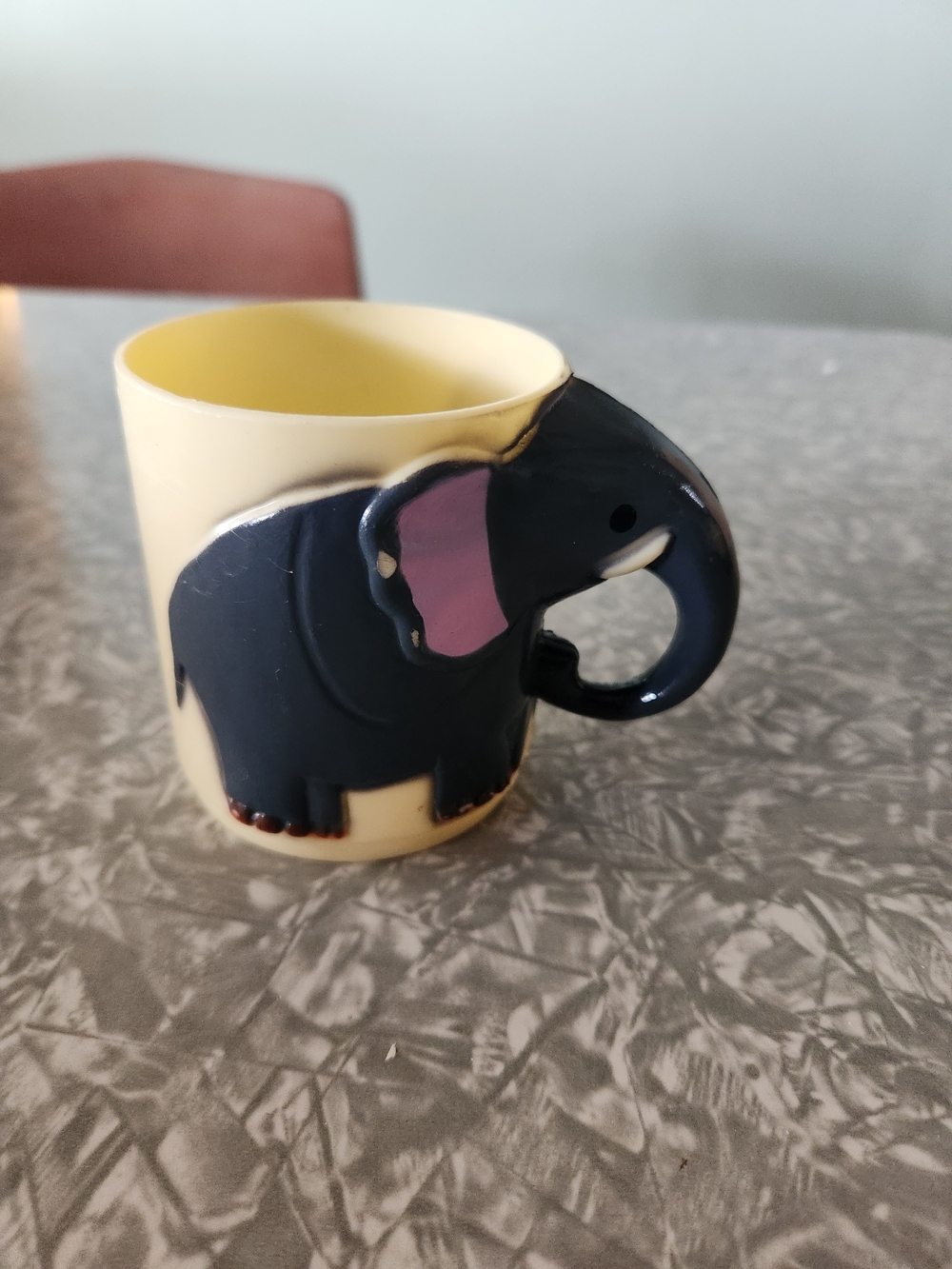 Source Unknown Yellow Cup with Navy and Pink Elephant Handle